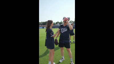 Zach Top with the official batting helmet of the @foldsofhonor celebrity softball game